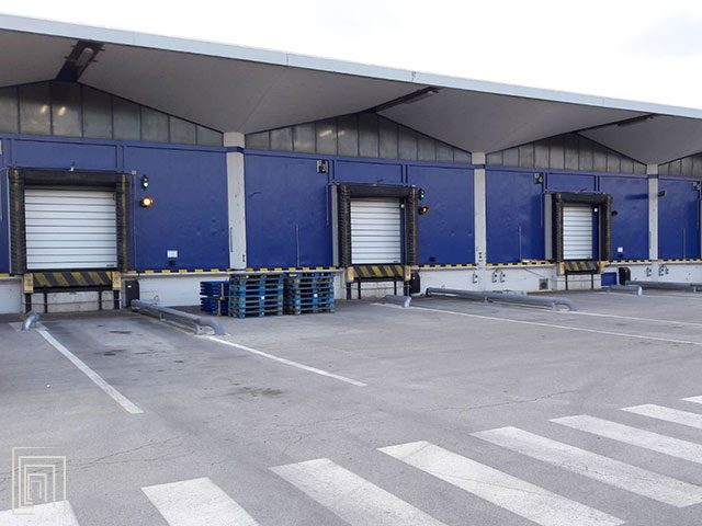 portoni industriali coibentati per baie di carico spiral 50 smart